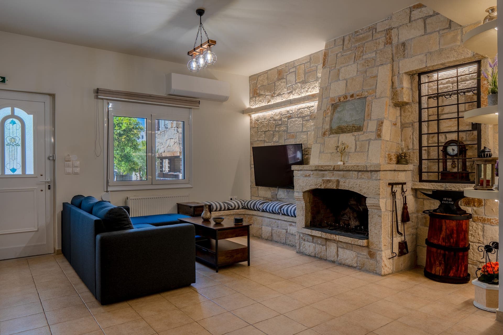 The stone fireplace at Casa di Tzaki